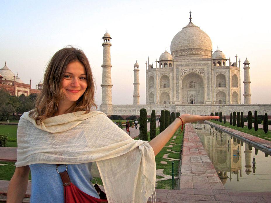 Girl Holding Taj Mahal In hand